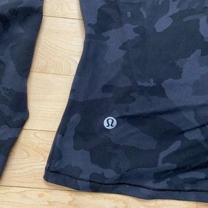 This piece fits a size small and is an athletic material.